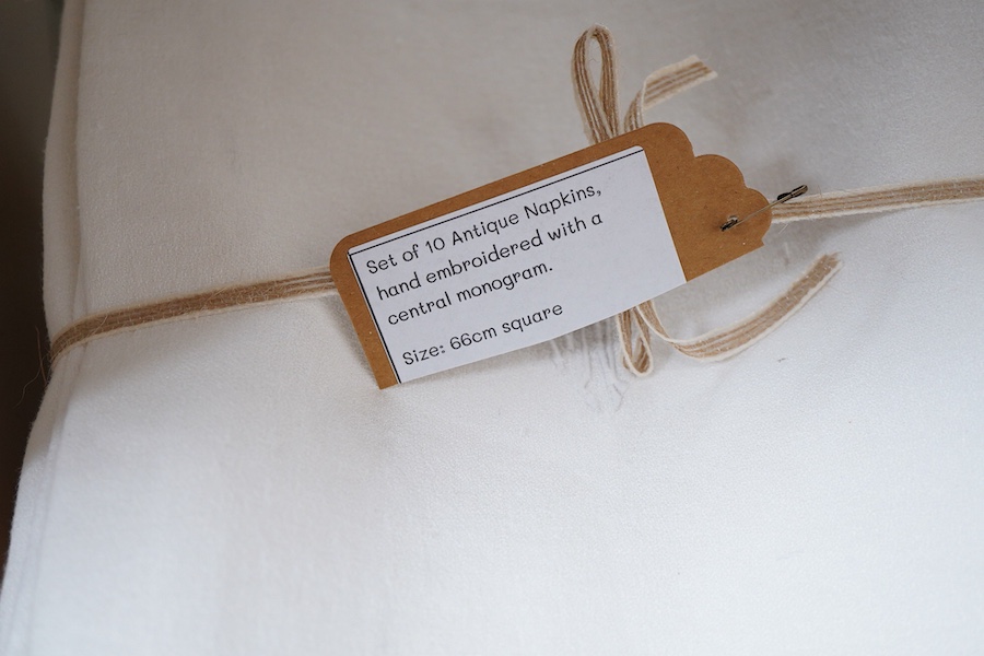 A collection of four sets of ten monogrammed French linen napkins and a similar set of twelve napkins, various odd sets of English Damask napkins, a large damask table cloth and a set of hand towels.